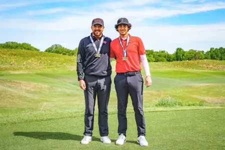 Adam Bresnu and Tim Wiedemeyer pose with Big 12 All-Tournament Team medals
