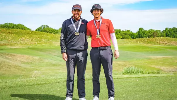 Adam Bresnu and Tim Wiedemeyer pose with Big 12 All-Tournament Team medals