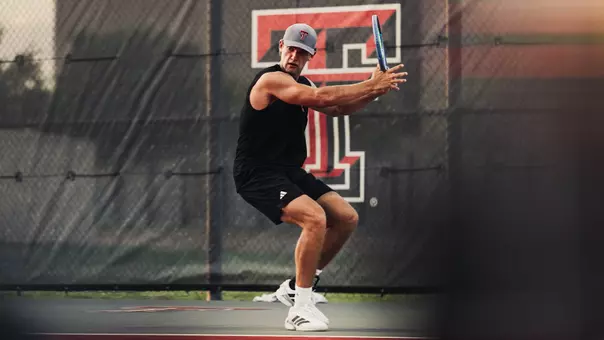 Tyler Stewart hitting a forehand against Arizona State.