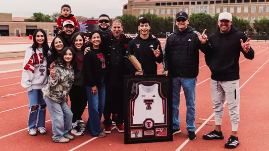George Garcia with his family on senior day