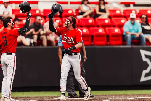 Kyeler Thompson celebrates his sixth inning home run against Oklahoma State