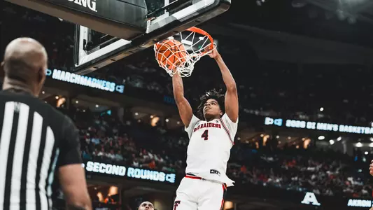Christian Anderson throws down a dunk in a win over Akron in the NCAA Tournament First Round.