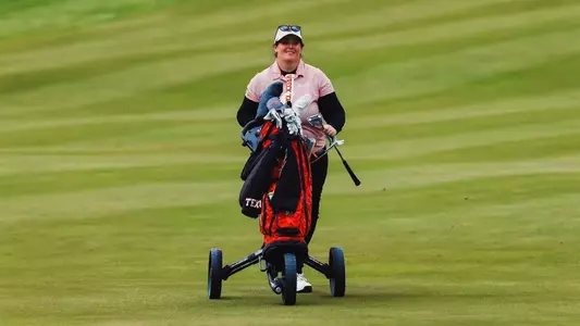 Lauren Zaretsky during round 1 of regional play walks the eight fairway