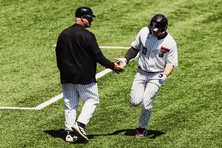 Logan Hughes rounds the bases after homering in the Red Raiders May 9 win against BYU
