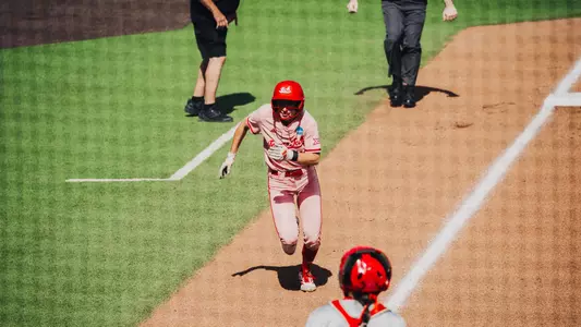 Logan Halleman running home to score a run against Marist