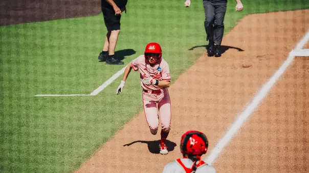 Logan Halleman running home to score a run against Marist