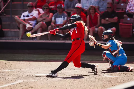 Mia Williams hitting a softball against Ole Miss