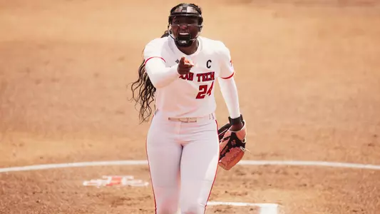 NiJaree Canady celebrating a strikeout with a finger point