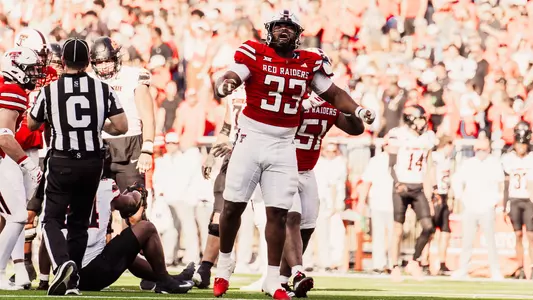 A.J. Holmes Jr. celebrates after a tackle for loss in Texas Tech's shutout win over Oklahoma State.