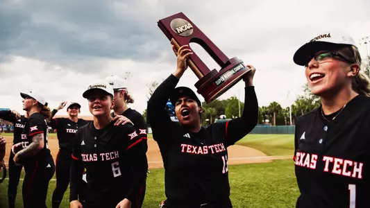 Victoria Valdez lifts the super regional trophy after Tech defeats Florida