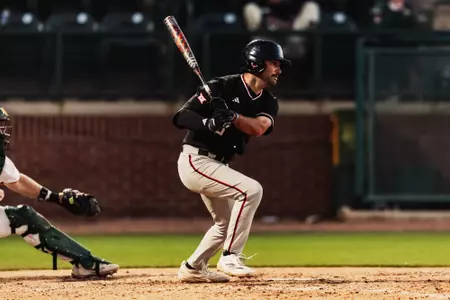 Texas Tech infielder Tracer Lopez takes a swing during Tech's Saturday doubleheader at Baylor