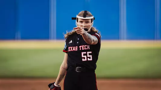 Kaitlyn Terry celebrates a strikeout against UCLA in the Women's College World Series.