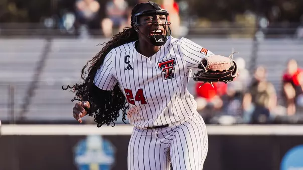 NiJaree Canady celebrating a pitch in softball