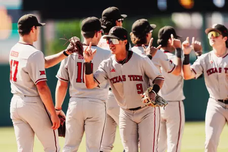 The Red Raiders celebrate their Sunday win at Baylor