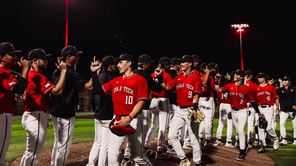 Texas Tech shakes hands and celebrates its 9-7 win over DBU Tuesday
