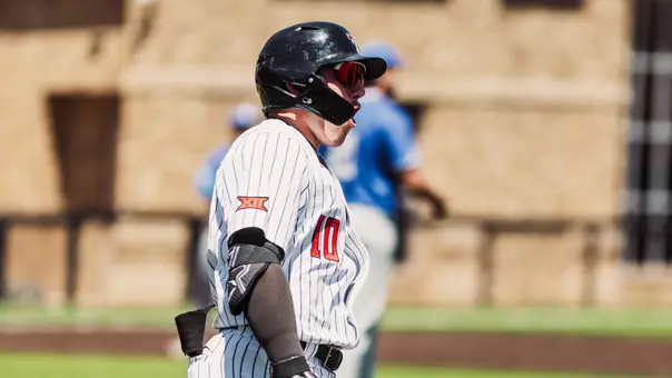 Logan Hughes screams out after lifting his 16th home run of the season Saturday vs. BYU