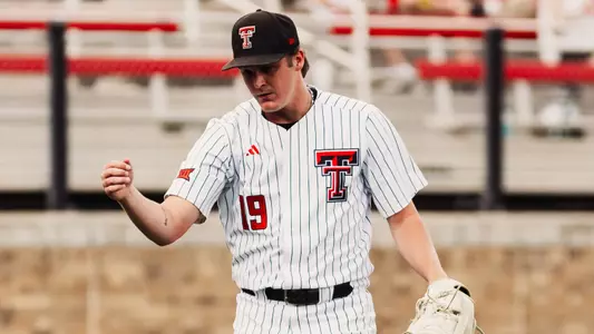 Jonny Lowe celebrates coming off the mound during Tech's 15-11 win over BYU