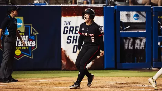Taylor Pannell celebrates scoring a run in the ninth inning of a win over UCLA in the Women's College World Series.