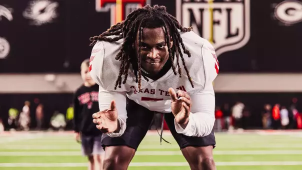 Terrance Carter Jr. warms up at spring practice No. 5