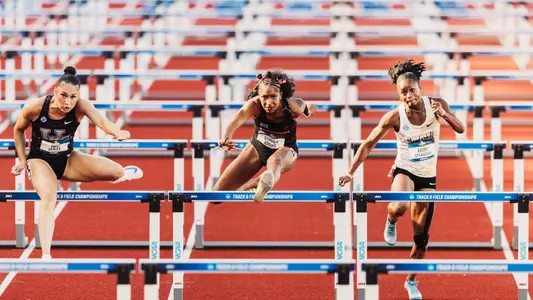 Symoria Adkins jumping over the hurdles at the 2026 NCAA Outdoor Championships
