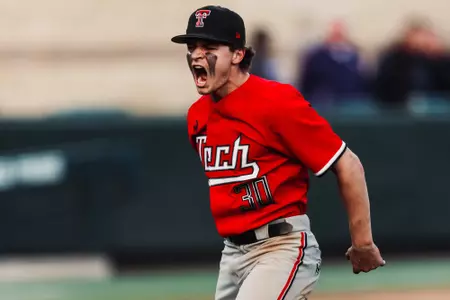 Jesse Rusinek Roars coming off the mound during a game at TCU