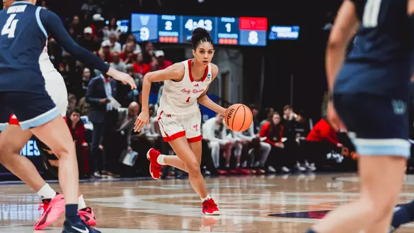 Jalynn Bristow brings the ball up the court in the NCAA Tournament.
