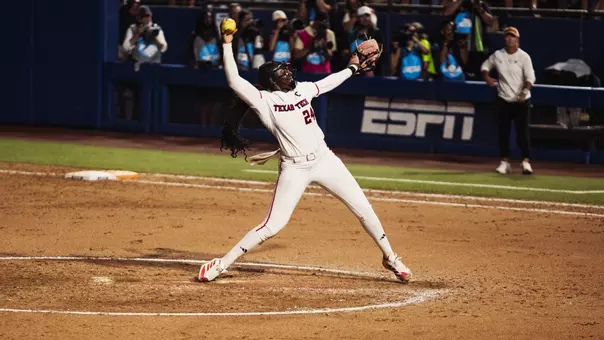 NiJaree Canady throwing a pitch in the women's college world series
