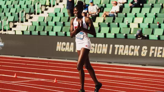 Temitope Adeshina celebrating on the track after winning the NCAA outdoor high jump title