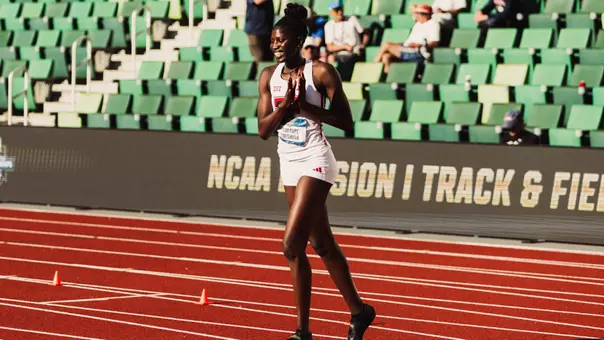 Temitope Adeshina celebrating on the track after winning the NCAA outdoor high jump title