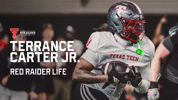 Thumbnail of Terrance Carter Jr. running with the football during a spring practice for the Red Raider Life series on TexasTech+.