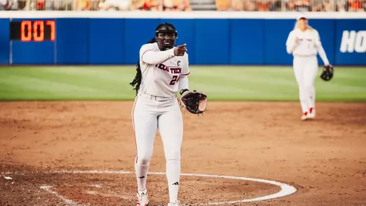 NiJaree Canady celebrates after a strikeout against Texas in the Women's College World Series Finals.