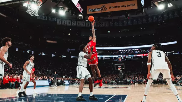 JT Toppin puts up a shot against a Duke defender in a win over the Blue Devils in Madison Square Garden.