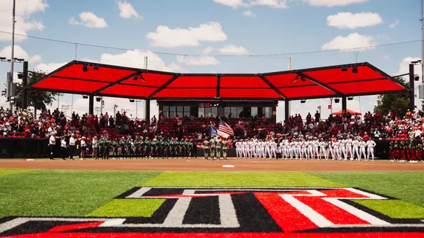 Tracy sellers field with baylor and texas tech lining up for the national anthem