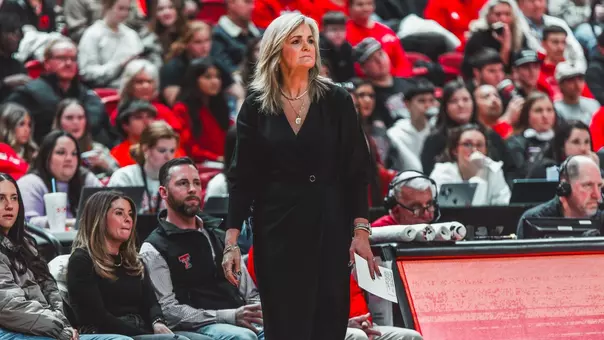 Lady Raiders Head Coach Krista Gerlich sideline in United Supermarkets Arena