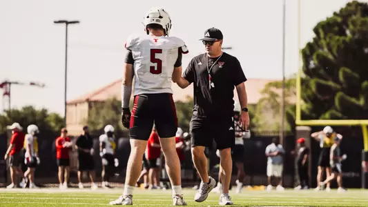 Mac Alexander working with Matt Ludwig at Texas Tech fall camp