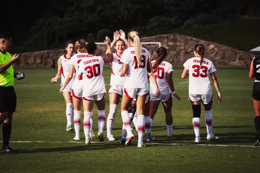 Texas Tech Freshman Logan Pang high-fives Storie Sexton following Sexton's first half goal