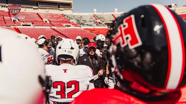 Joey McGuire speaks to his team prior to Texas Tech's first scrimmage of preseason camp.