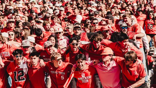 Texas Tech's student sections sways back and forth prior to the fourth quarter of a 2025 home game.
