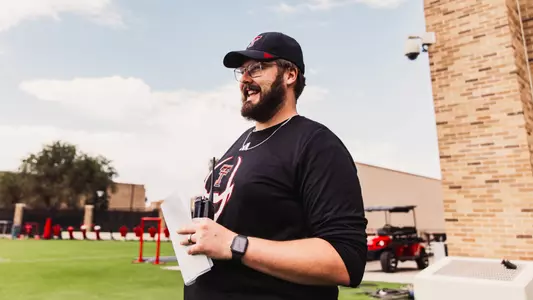 Eric Gerald smiling during football prectice