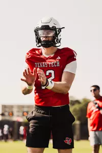 Cannon prepares to receive a snap during a drill
