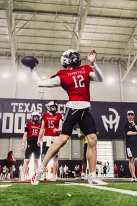 Stephen prepares to throw the ball during a practice drill