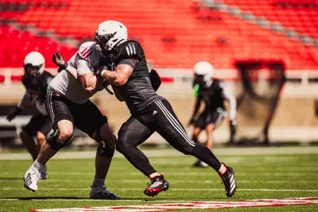 Trick striking a oncoming blocker.