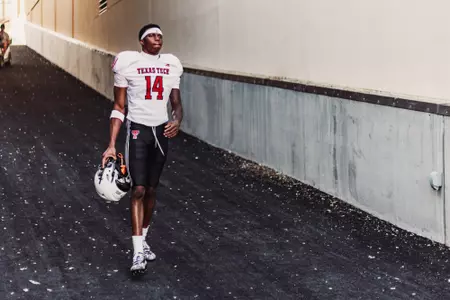Jones heads down the tunnel before a scrimmage.