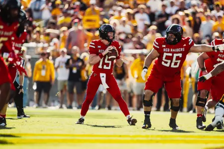Hammond drops back in the pocket, looking downfield.