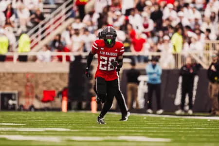 Braylan McDonald sprints downfield during home game against Kent State.