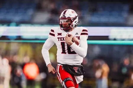 Jones makes a play running the ball downfield.