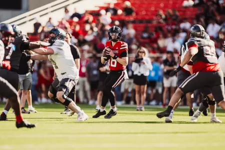 Kirk Francis waiting for the perfect time to pass the ball and make a play.