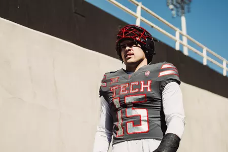 Austin heads down the tunnel before kickoff for a scrimmage.