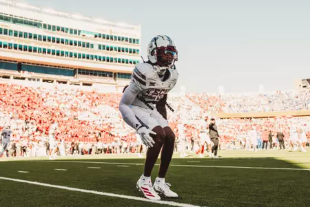 Mikal Harrison-Pilot warming up on the field before a game