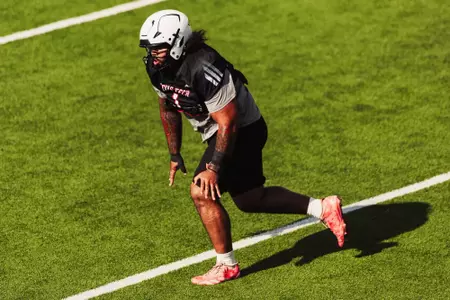 Laventure prepares to make a tackle during a scrimmage.